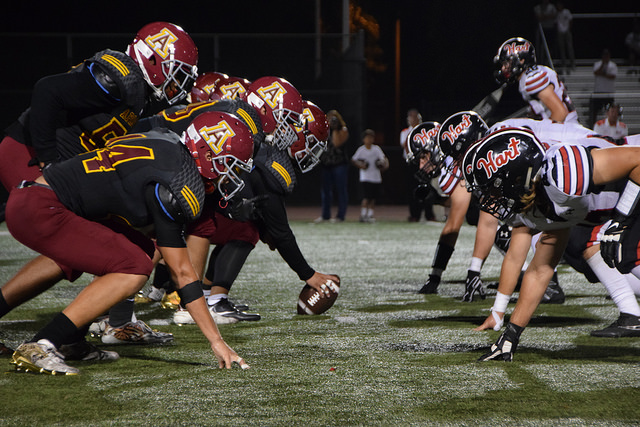 The Apaches charge head on against Hart High School