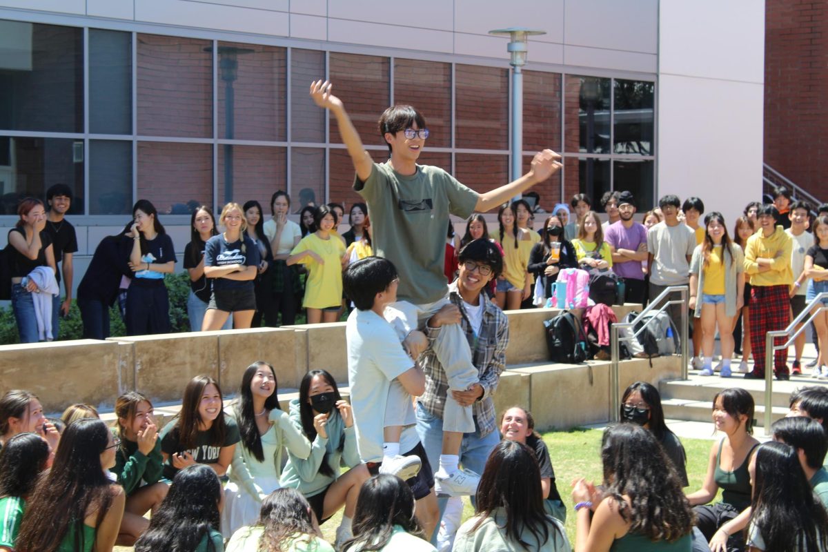APES students enthusiastically engage in platoon cheers during lunch.