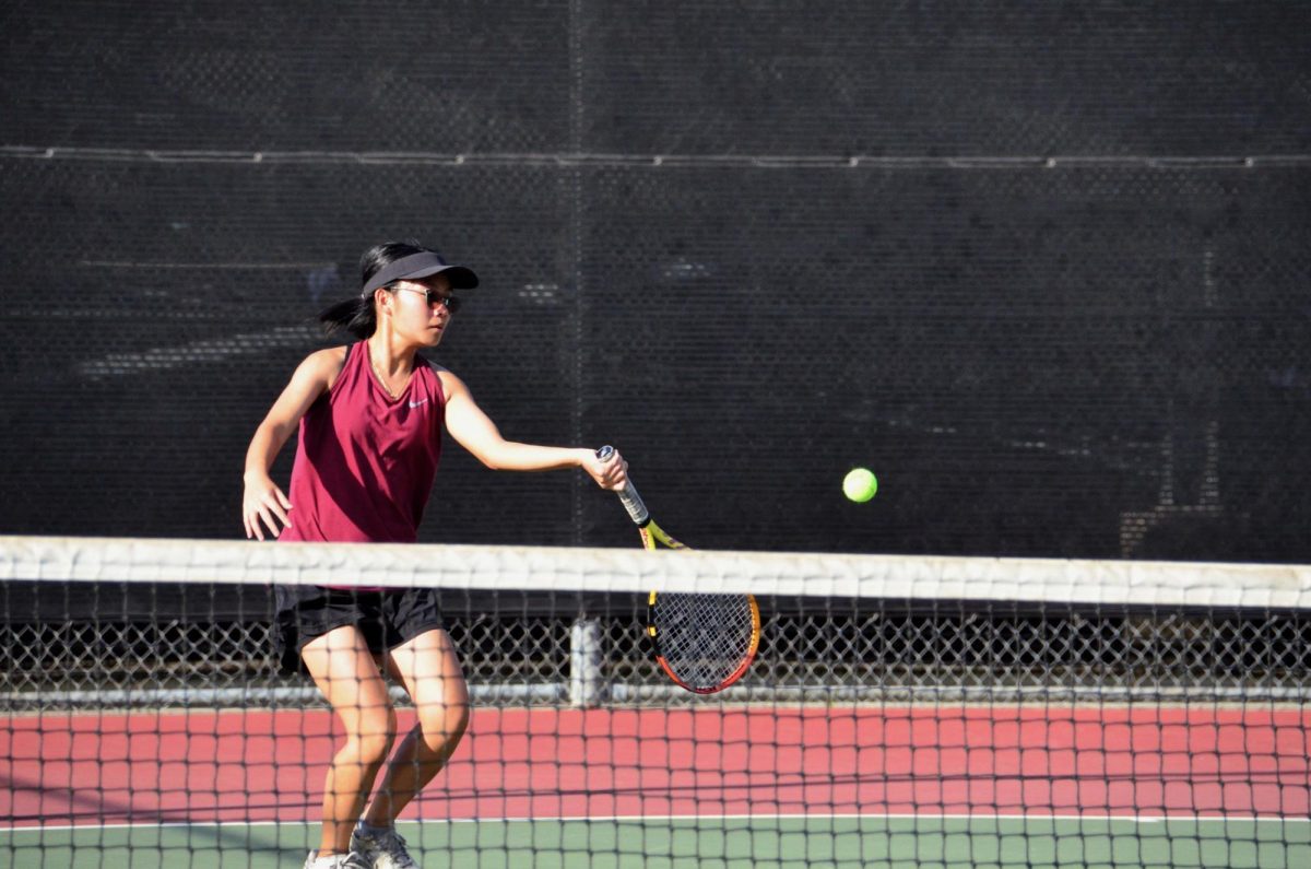 A player swoops the ball with a left-handed forehand!