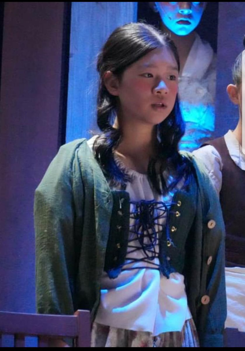 Cai as a maid in The Odyssey.