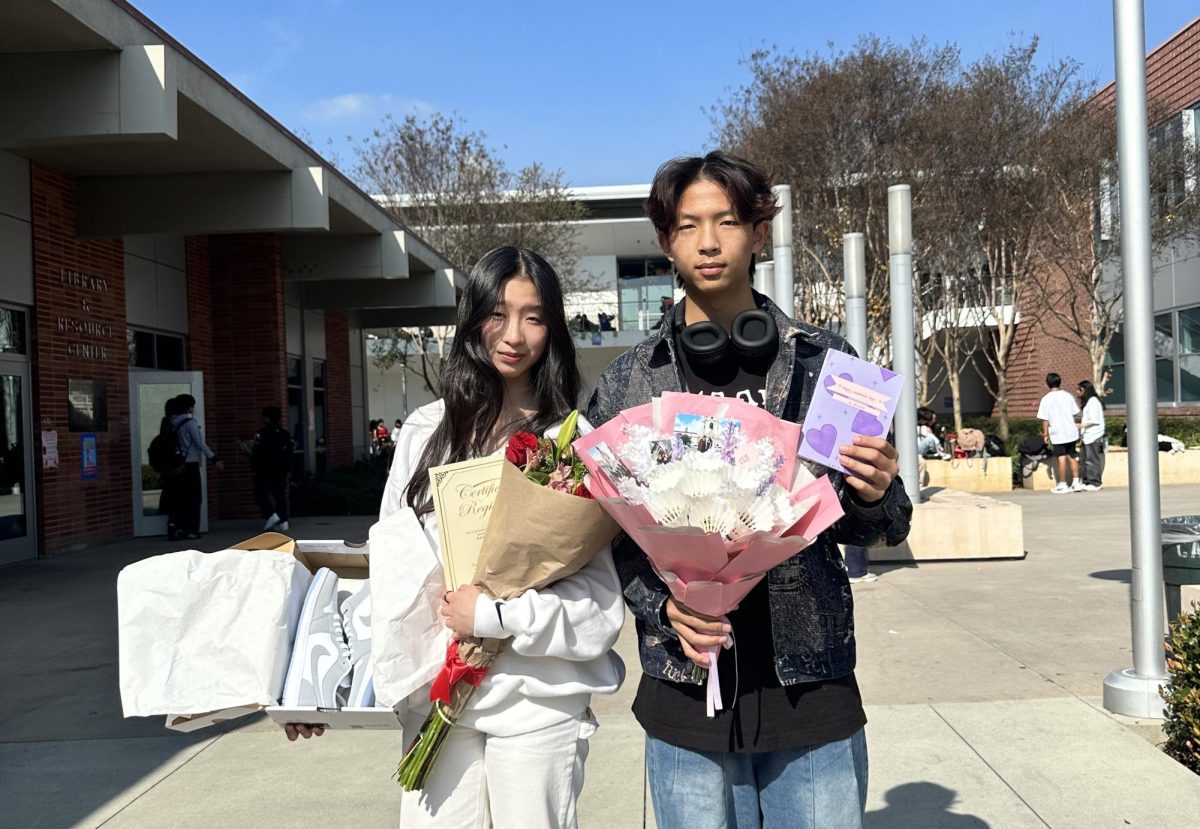 Couple Ellie Wu & Howard Sun exchange gifts on Valentine’s Day. 