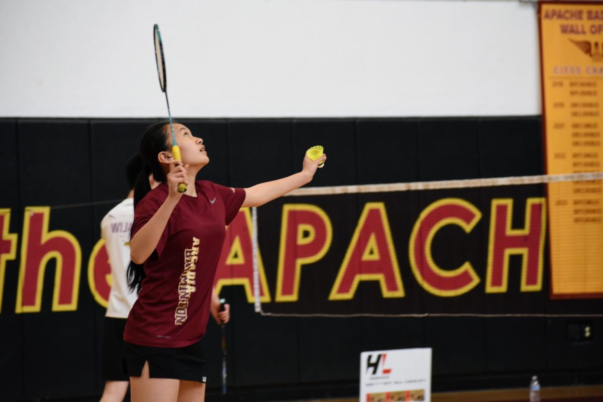 Freshman+Melody+Pei+warms+up+before+her+singles+match+on+court+2.