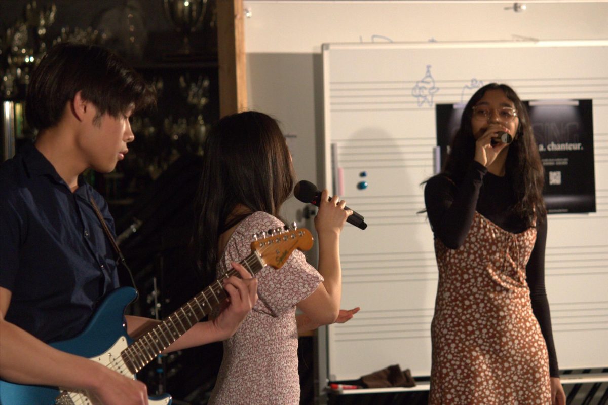Gavin Ngo, Michelle So, Avani Athavale , and Faith Harnanto (not pictured) performing doomsday by Lizzy McAlpine.
