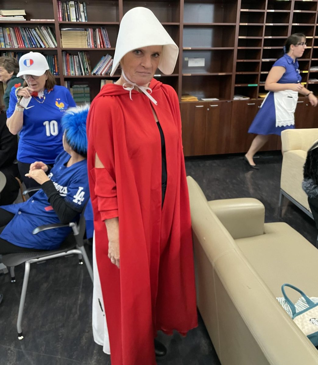 Ms. Ashley Novak in her costume, inspired by Handmaid's Tale