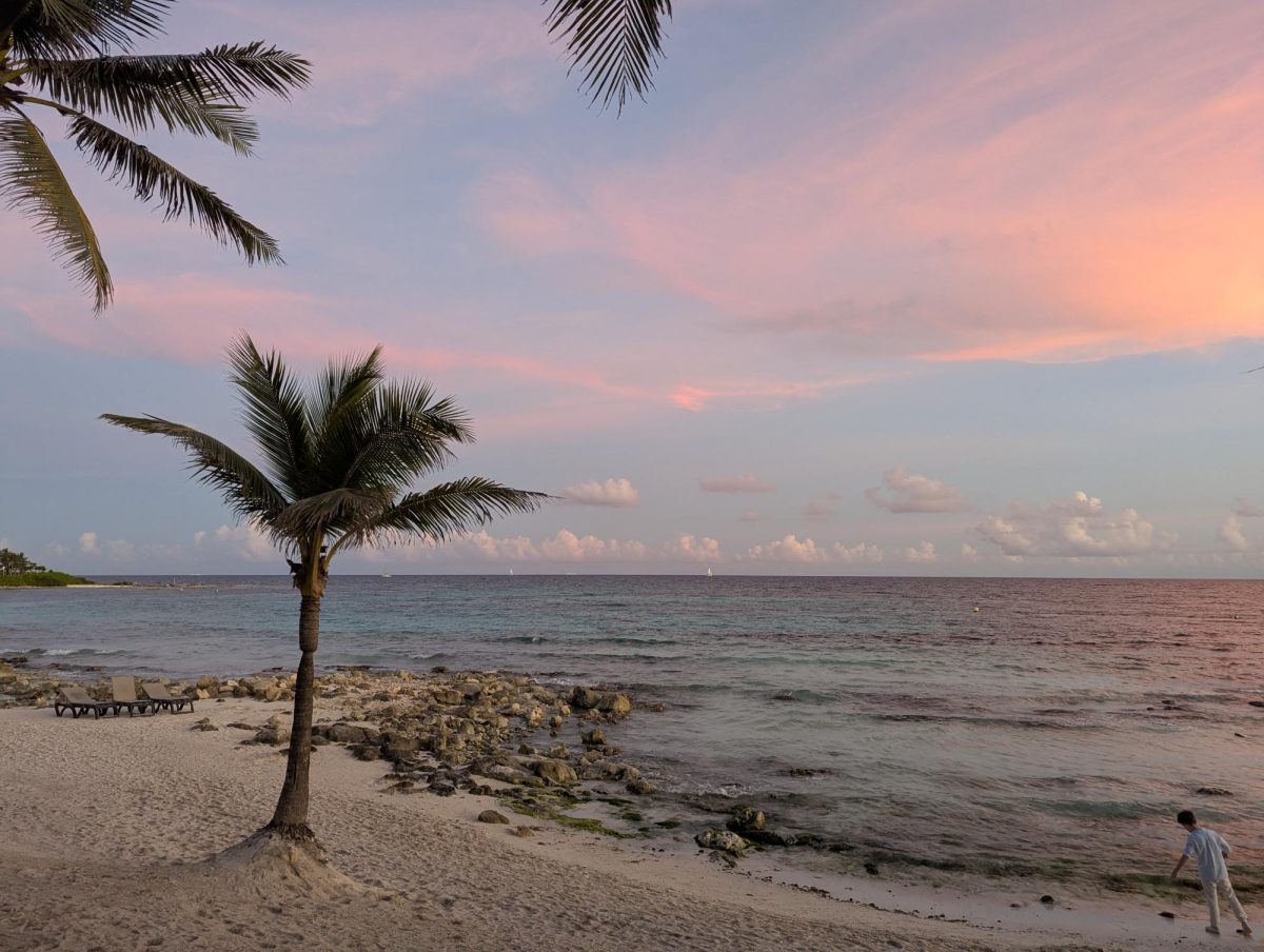 The sun setting on a beach in Cancun, just before the new year.