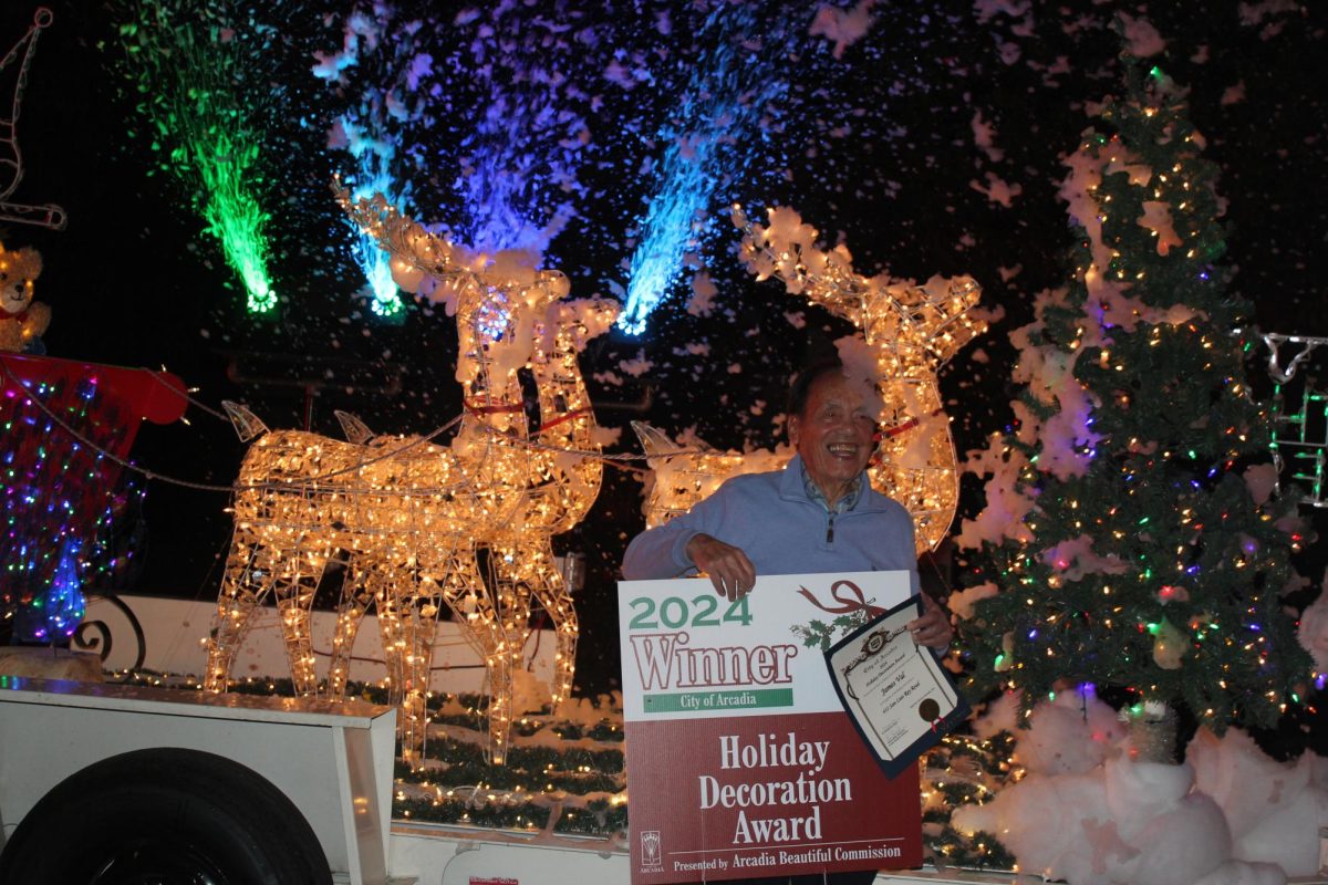 Arcadia resident James Val poses for a photo after receiving the 2024 Arcadia Holiday Decoration Award