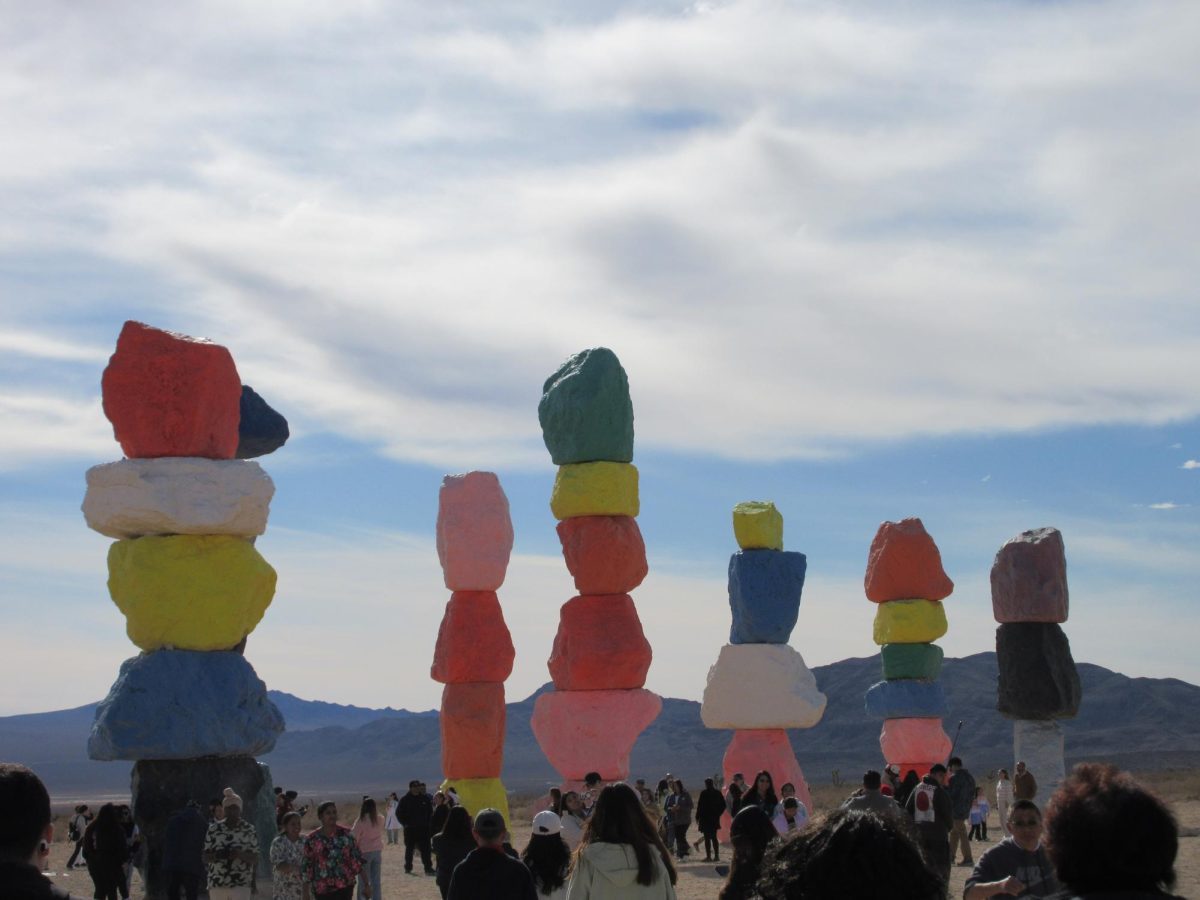 Vibrantly colored rocks meet the barren desert at Seven Magic Mountains.