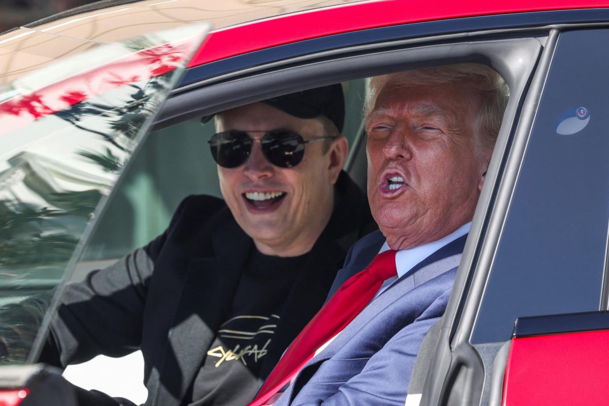 U.S. President Donald Trump and Tesla CEO Elon Musk sit in a Tesla car model S, in front of the White House in Washington, D.C., U.S., March 11, 2025. REUTERS/Kevin Lamarque