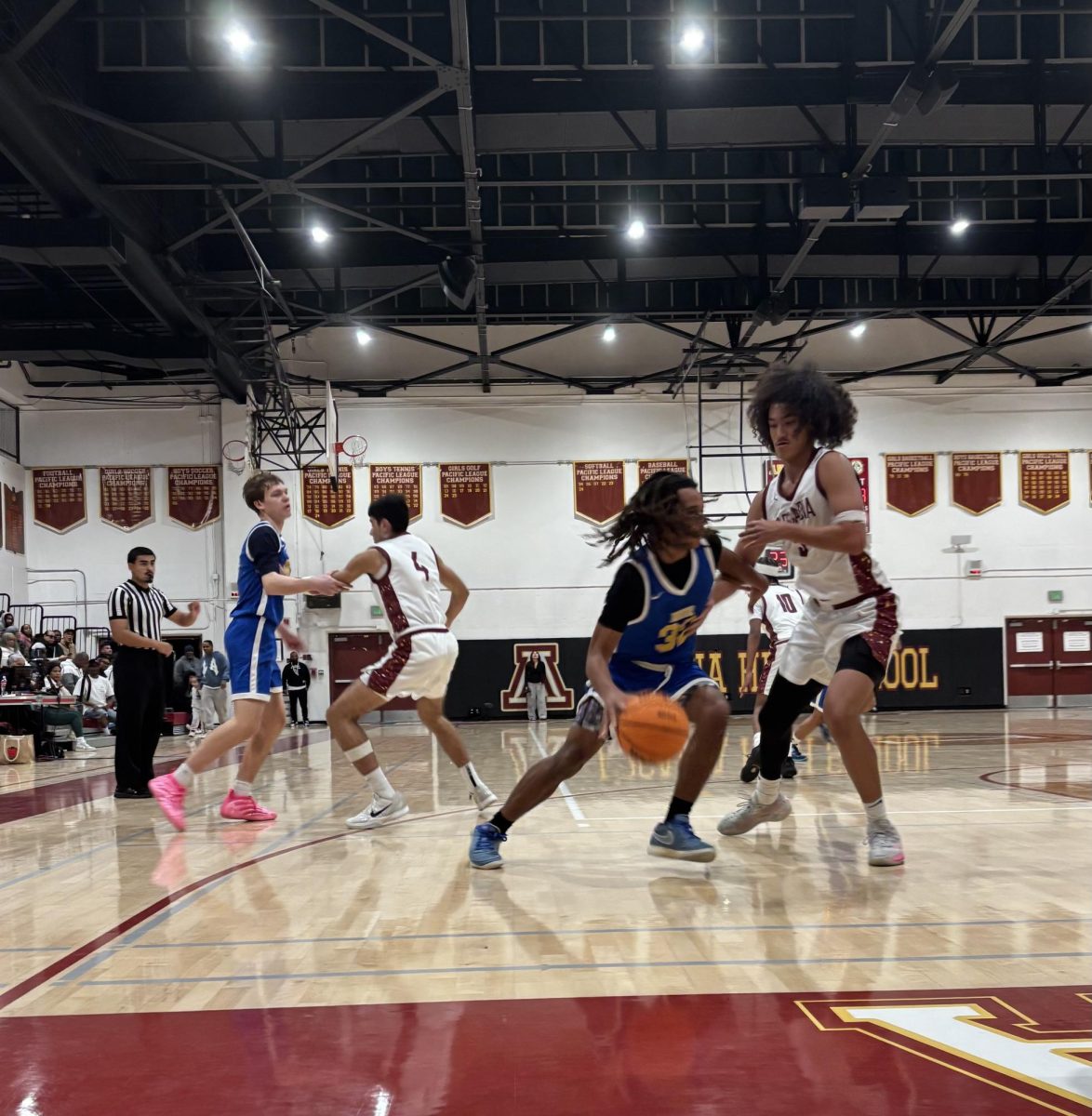 Boys Varsity Basketball Competes Against Muir